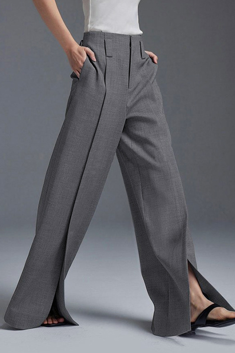 Lässige, einfarbige, geraffte, lockere Hose mit Taschenschlitz und hoher Taille sowie weitem Bein in einfarbiger Ausführung (ohne Hüftgurt).