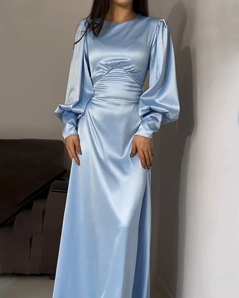 Elegant waisted pleated cuff dress