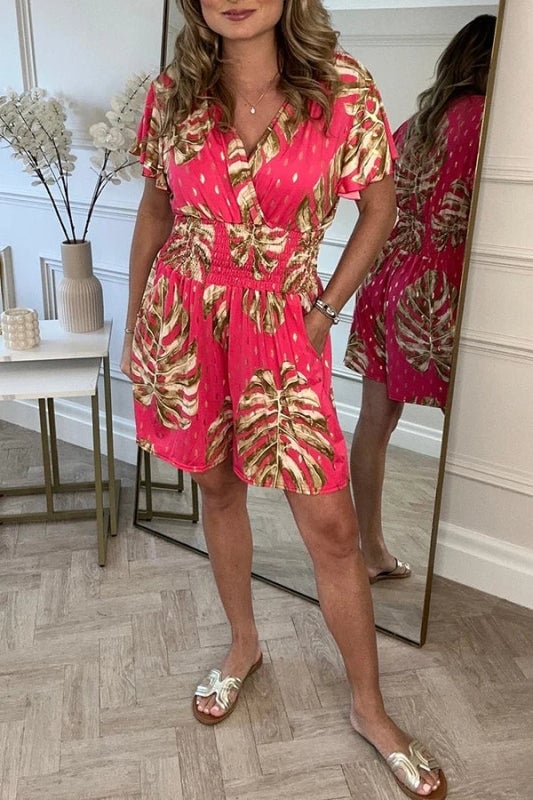 Lässiger Strampler mit Blumenmuster und gepunkteten Taschen