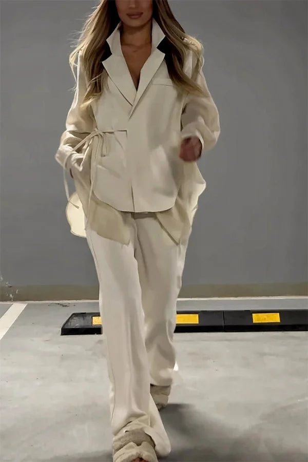 Ensemble veste à lacets irréguliers en mousseline de soie chic et élégant et pantalon droit à poches