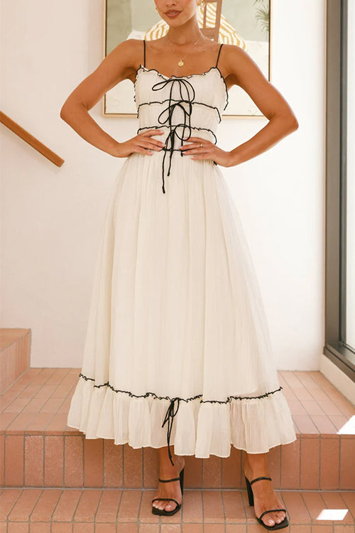 Rosiedress – Swing-Maxi-Cremekleid mit Rüschenbesatz und Schleife