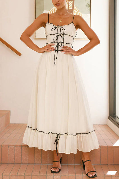 Rosiedress – Swing-Maxi-Cremekleid mit Rüschenbesatz und Schleife