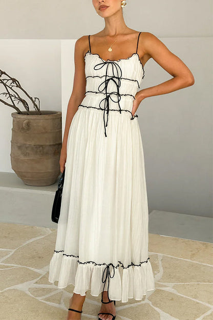 Rosiedress – Swing-Maxi-Cremekleid mit Rüschenbesatz und Schleife