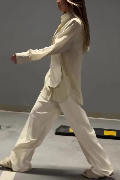 Ensemble veste à lacets irréguliers en mousseline de soie chic et élégant et pantalon droit à poches