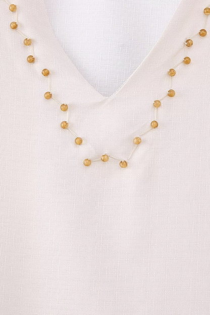 Robe trapèze élégante à imprimé floral, volants, col en V et perles