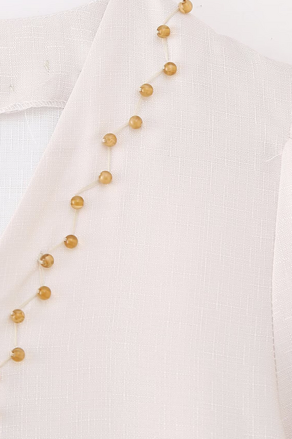 Robe trapèze élégante à imprimé floral, volants, col en V et perles