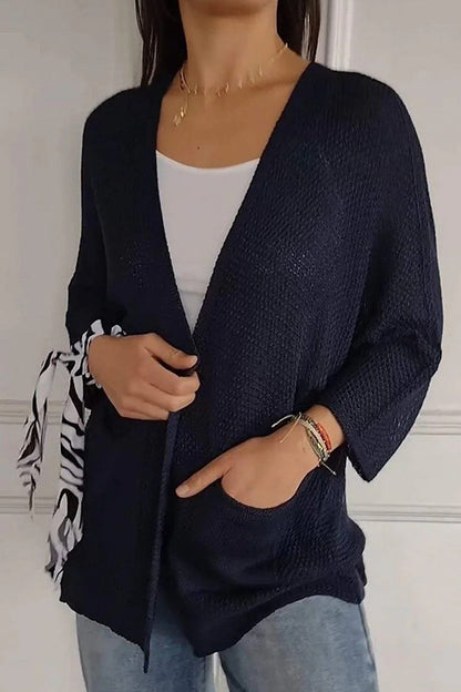 Cardigan décontracté à poches de couleur unie