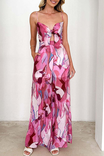 Lässiger, lockerer Jumpsuit mit Blumendruck, Taschen und Kontrast