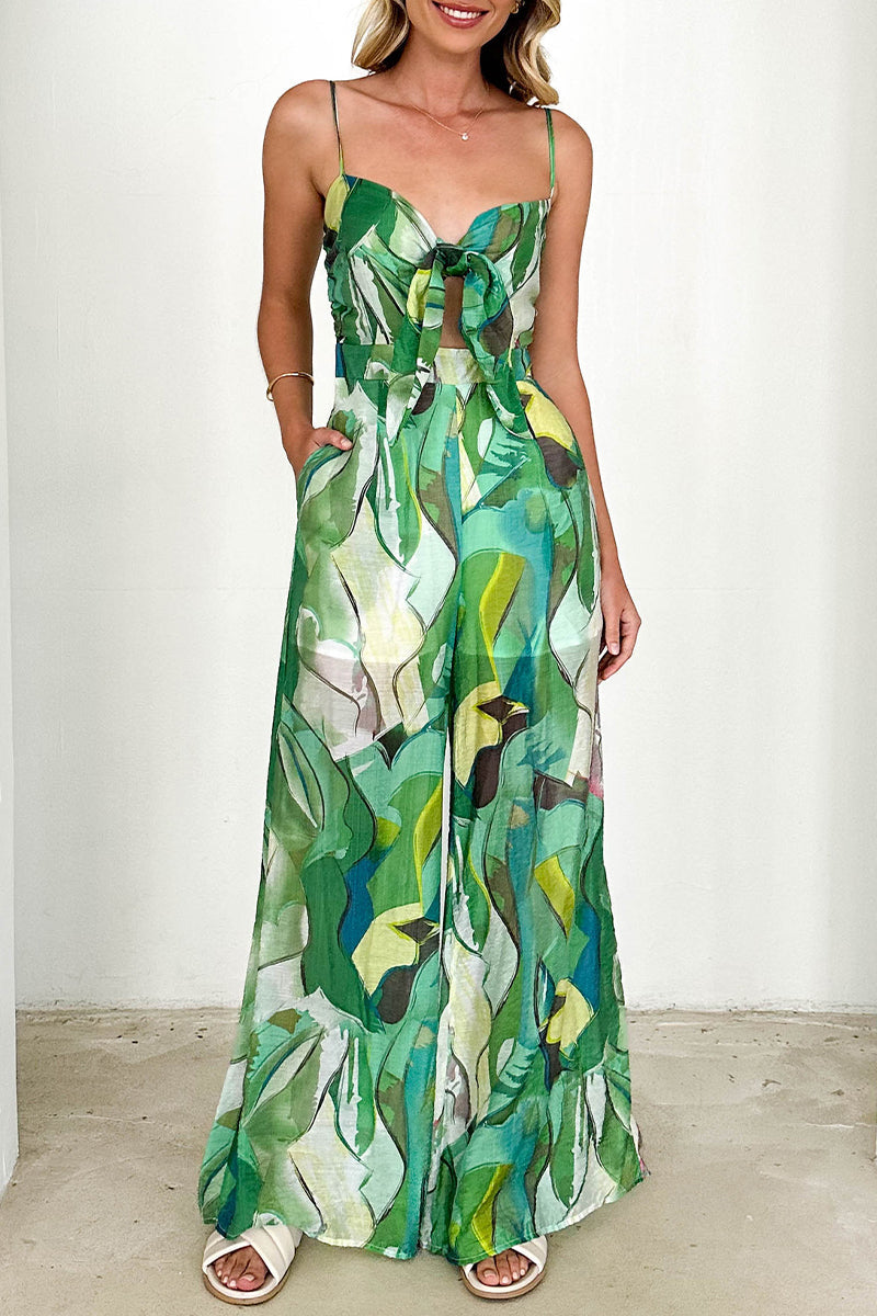 Lässiger, lockerer Jumpsuit mit Blumendruck, Taschen und Kontrast