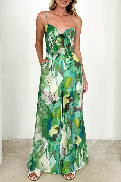 Lässiger, lockerer Jumpsuit mit Blumendruck, Taschen und Kontrast