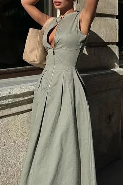 Robe longue décontractée à col rond avec poches et fermeture éclair de couleur unie