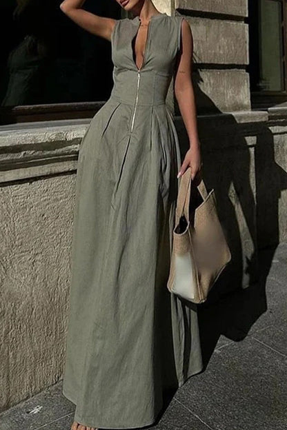 Robe longue décontractée à col rond avec poches et fermeture éclair de couleur unie