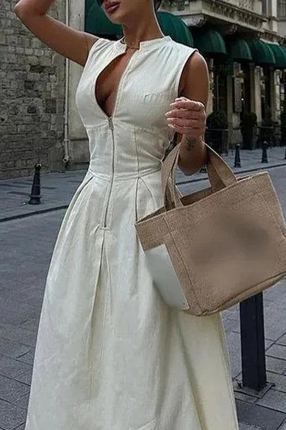 Robe longue décontractée à col rond avec poches et fermeture éclair de couleur unie