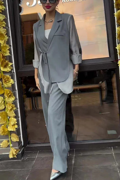 Ensemble veste à lacets irréguliers en mousseline de soie chic et élégant et pantalon droit à poches