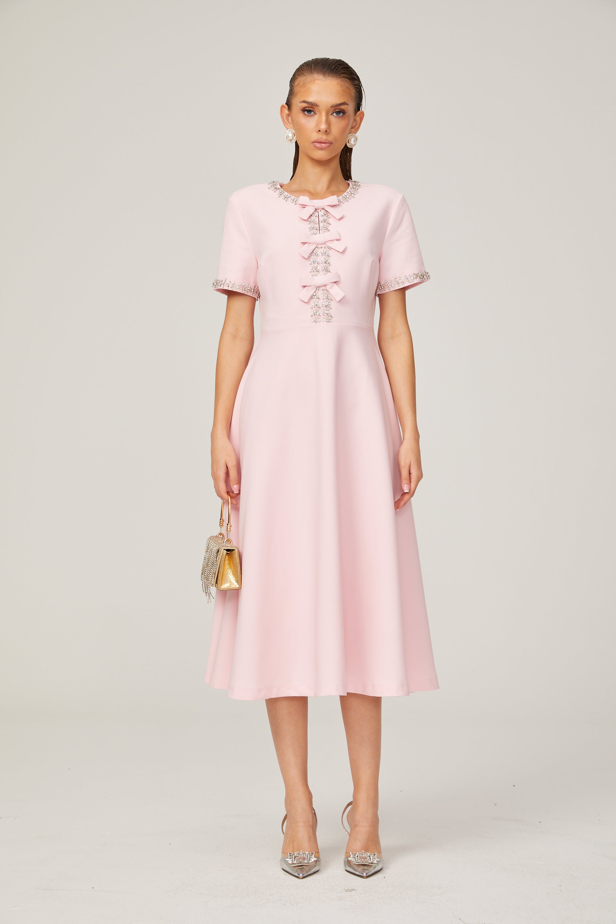 Cassi crystal-accented pink bow midi dress