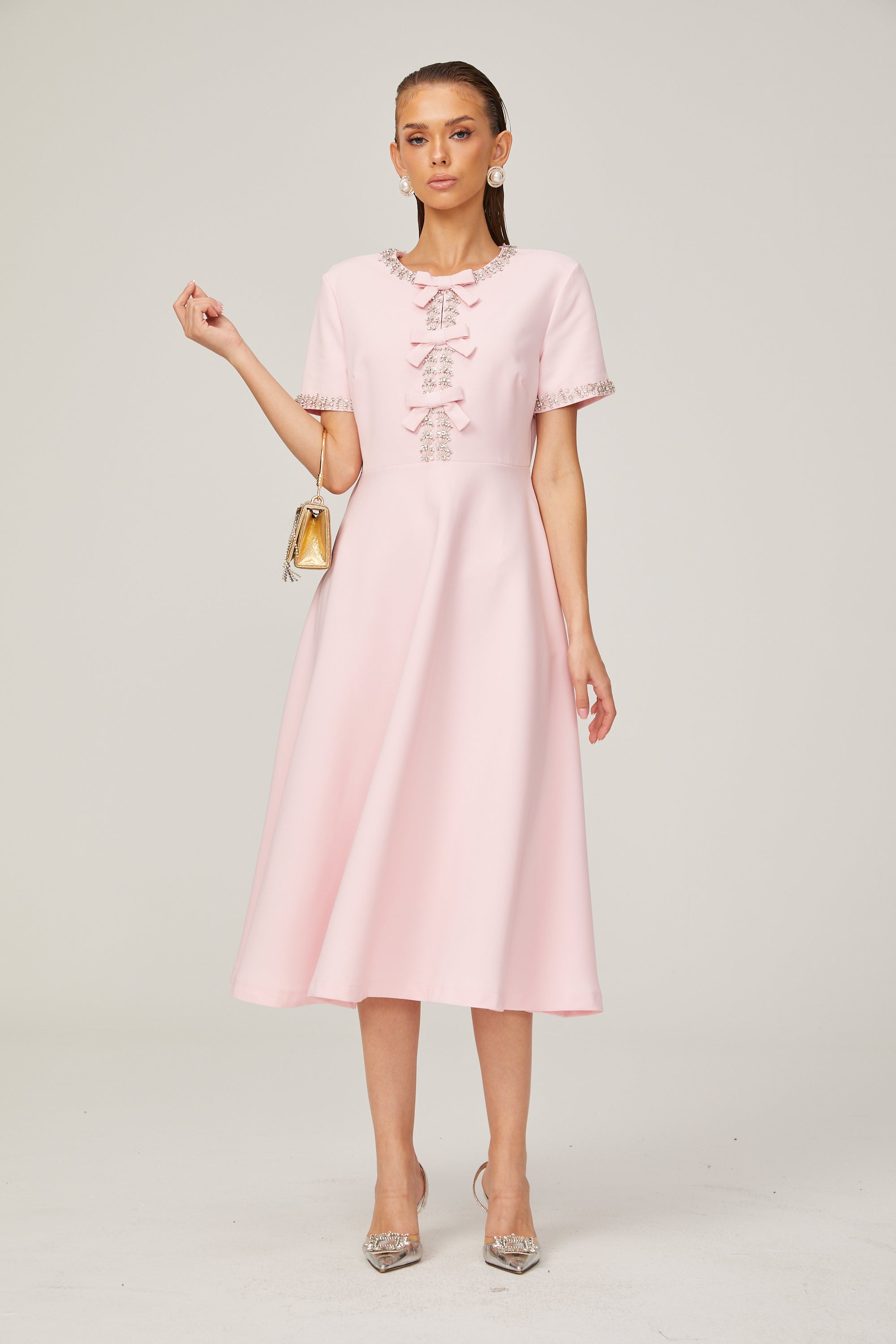 Cassi crystal-accented pink bow midi dress