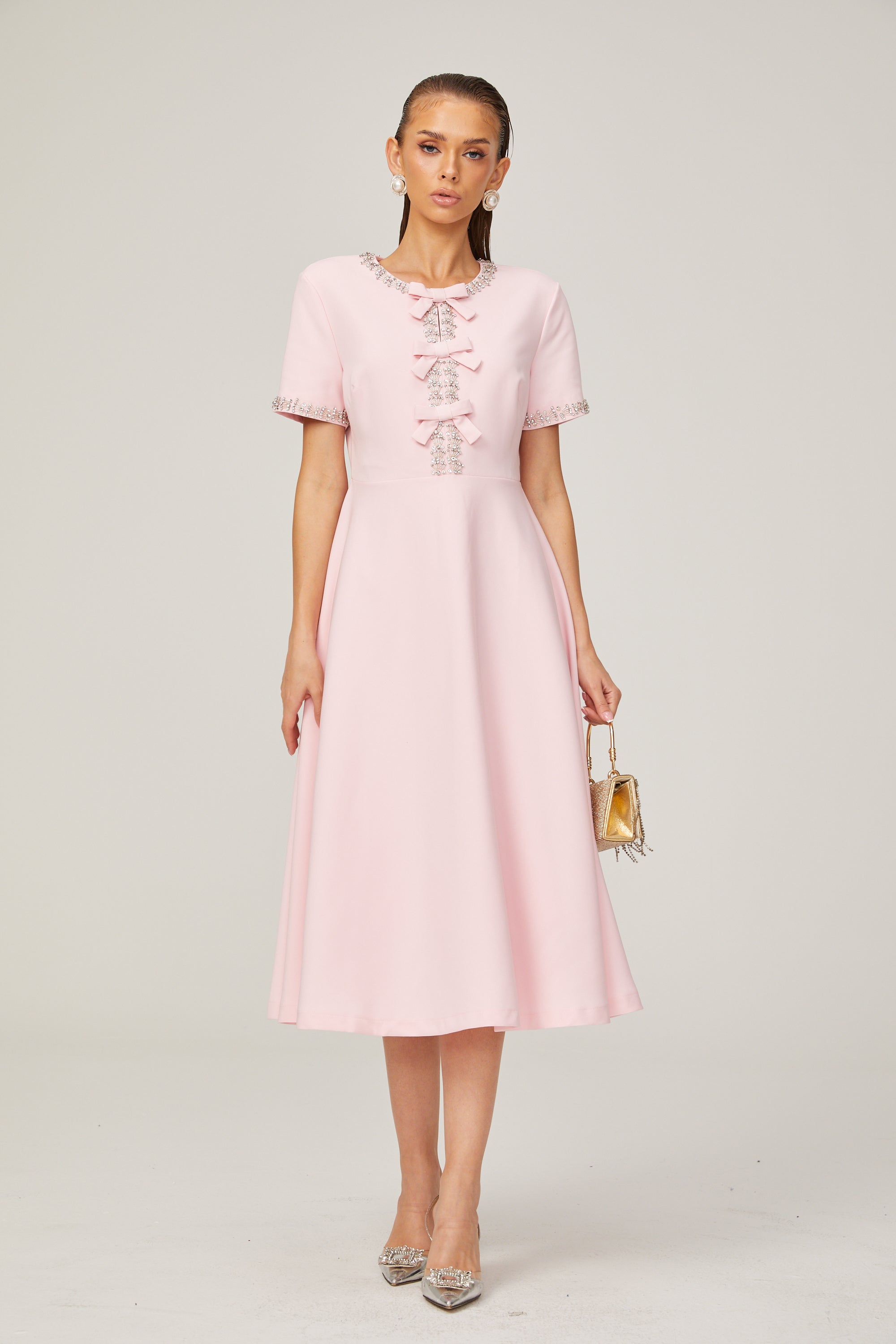 Cassi crystal-accented pink bow midi dress