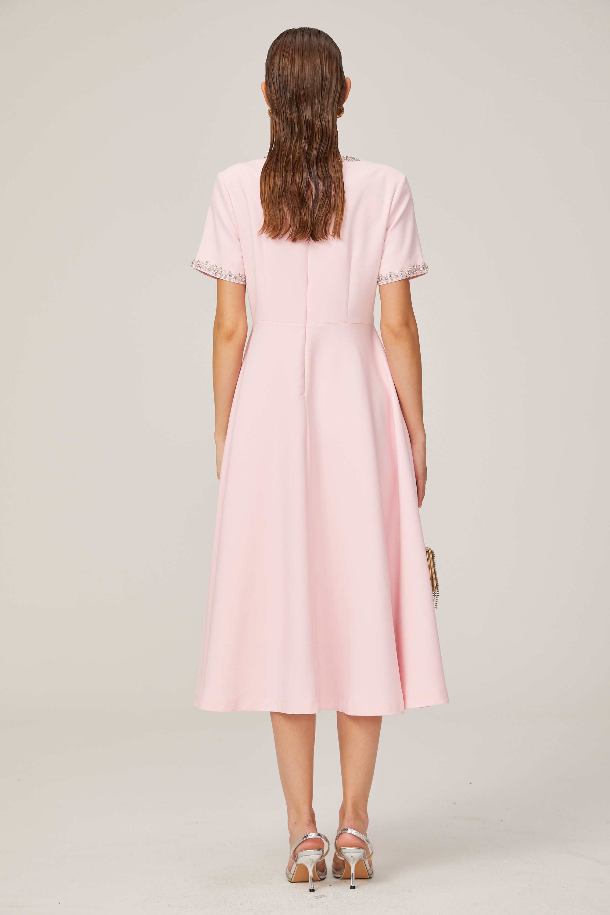 Cassi crystal-accented pink bow midi dress