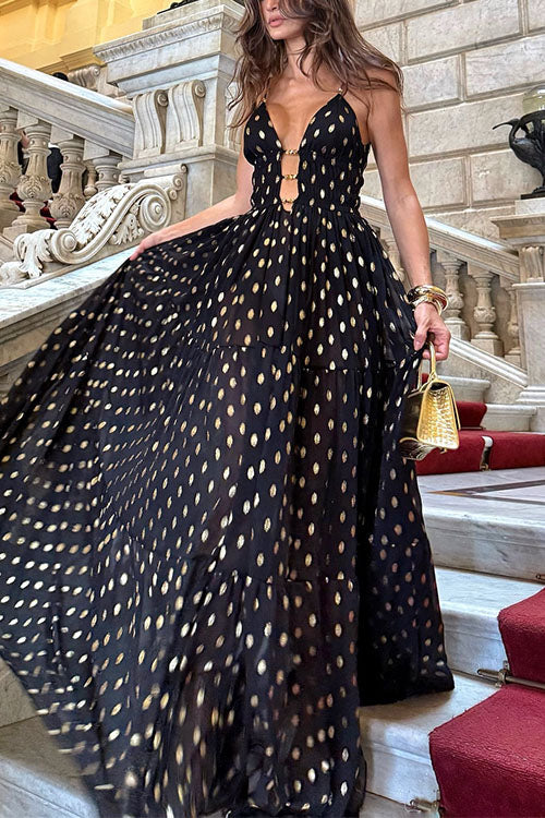 Robe longue trapèze à pois découpés et volants