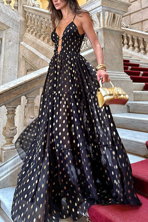 Robe longue trapèze à pois découpés et volants