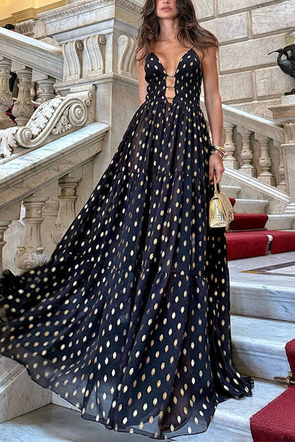 Robe longue trapèze à pois découpés et volants