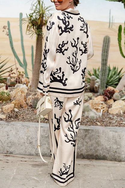 Chemise boutonnée à manches longues en satin imprimé récif