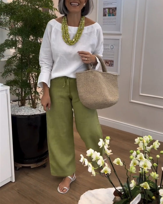 Haut blanc à manches longues et col rond + pantalon vert ample et décontracté