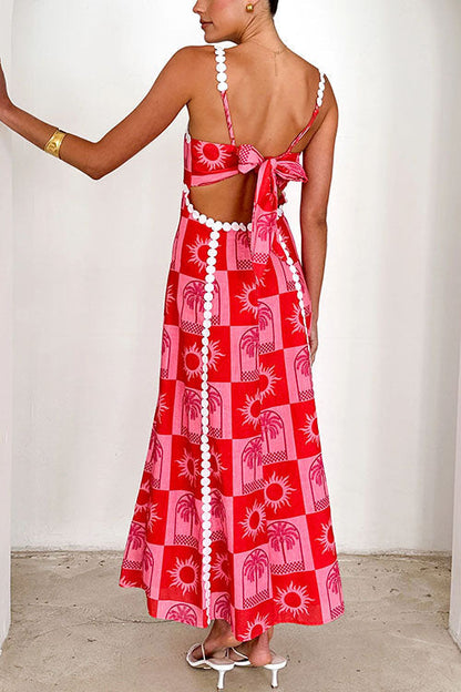 Rosiedress – Maxi-Cremekleid mit Zickzack-Besatz und Schleife auf der Rückseite und Palm Soleil-Print