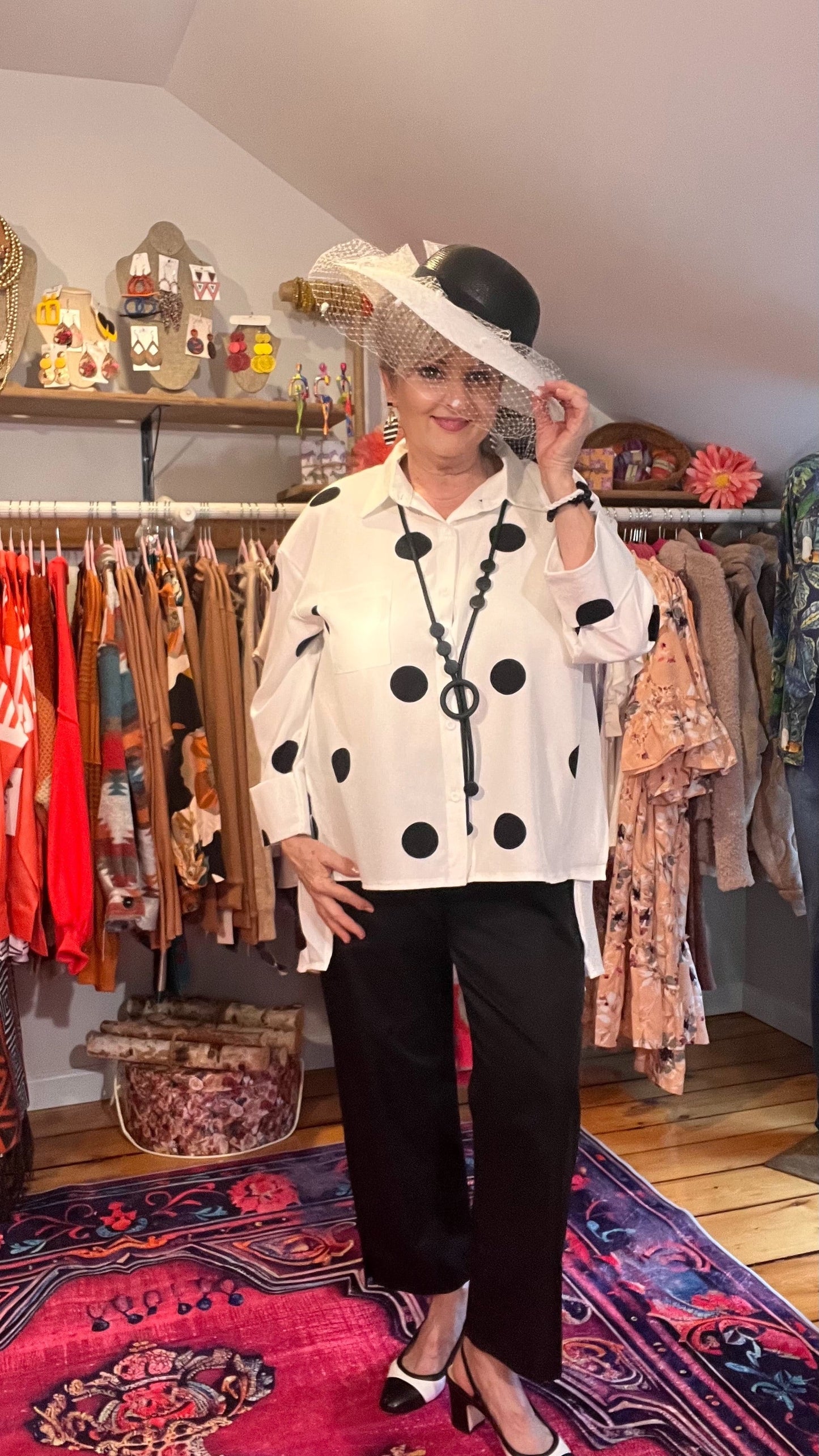 Polka Dot Perfection: Collared Button-Through Blouse with High-Low Hem