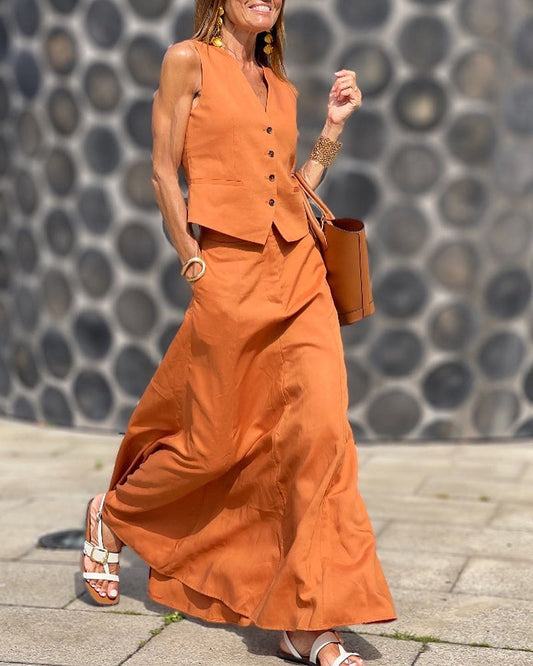 two piece set sleeveless v neck crop top and midi flared skirt suits