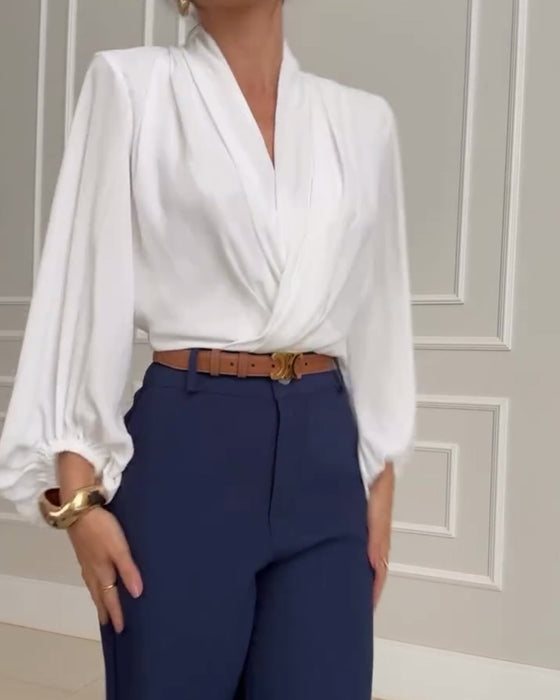 Modische Bluse mit V-Ausschnitt und Laternenärmeln in Volltonfarbe