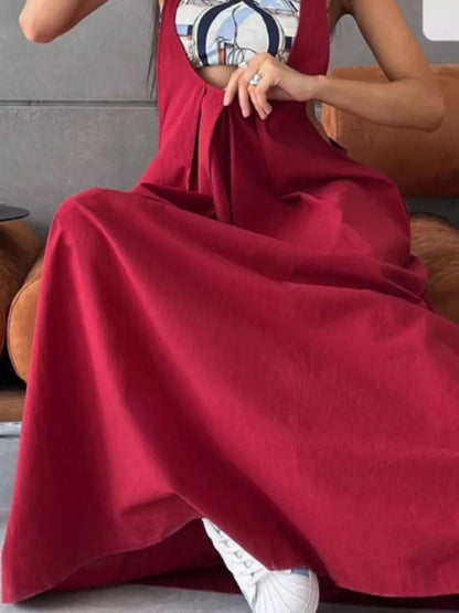 Plissiertes Latzkleid mit Taschen